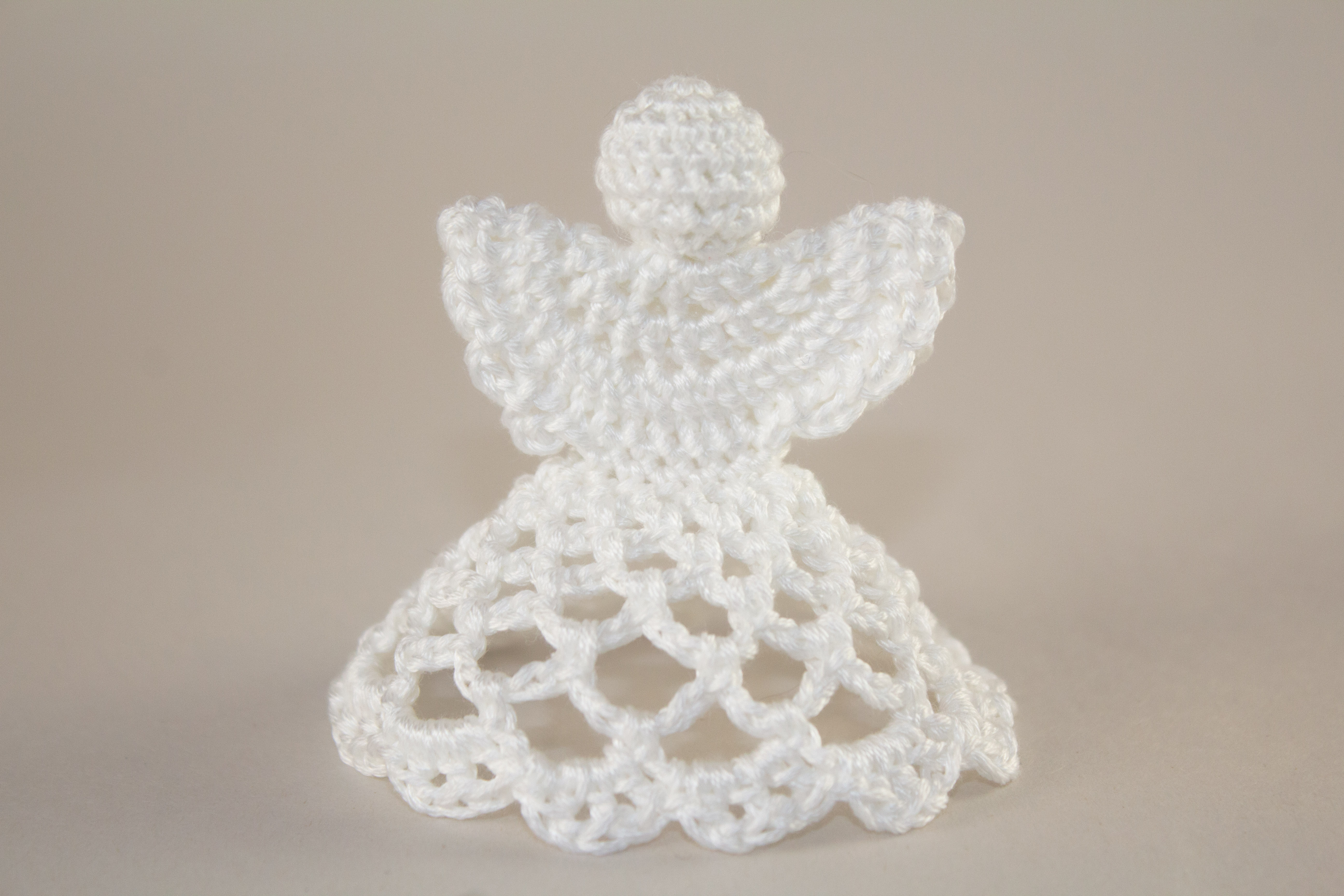 Crochet angel made from embrodery floss